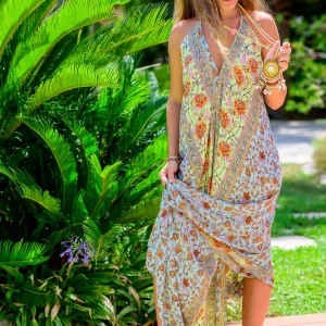 Longue robe dos nu en soie imprimé petites fleurs