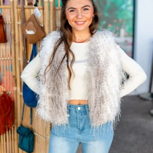 Gilet court sans manches à poils (faux poils)